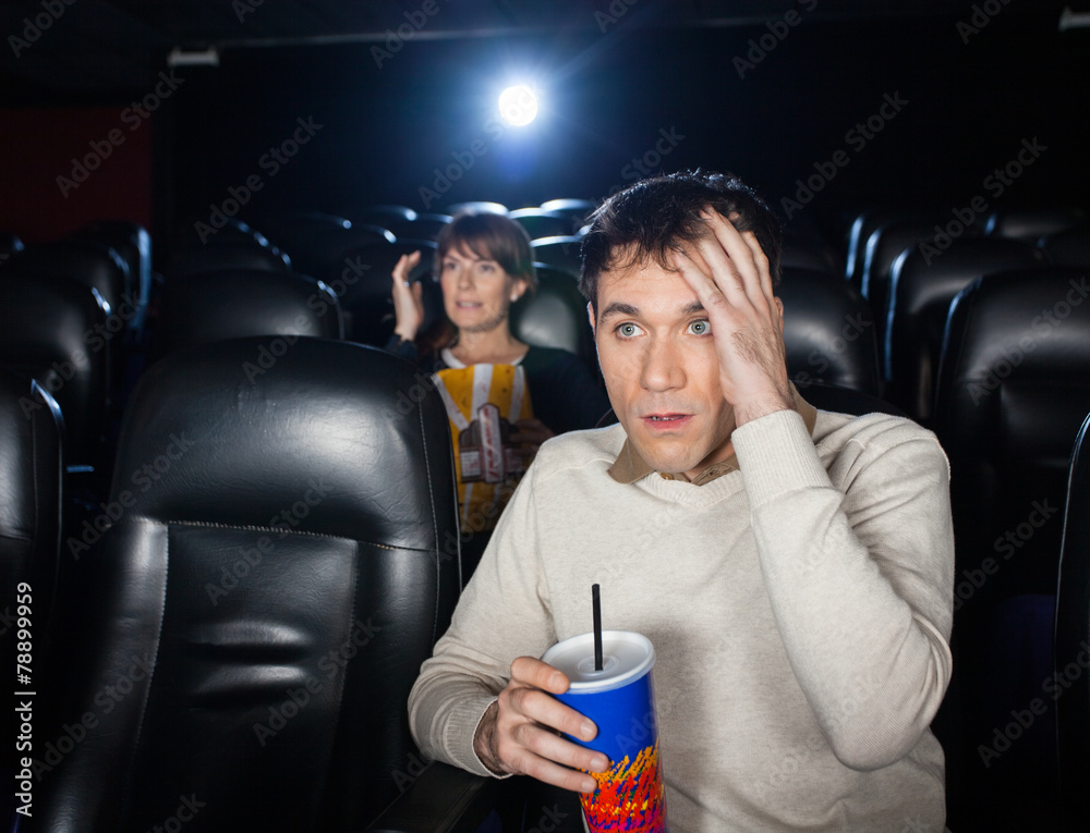 Fototapeta premium Terrified People Watching Film