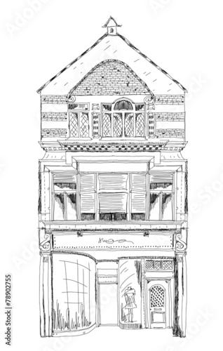 Fototapeta  Old English town house with small shop or business 