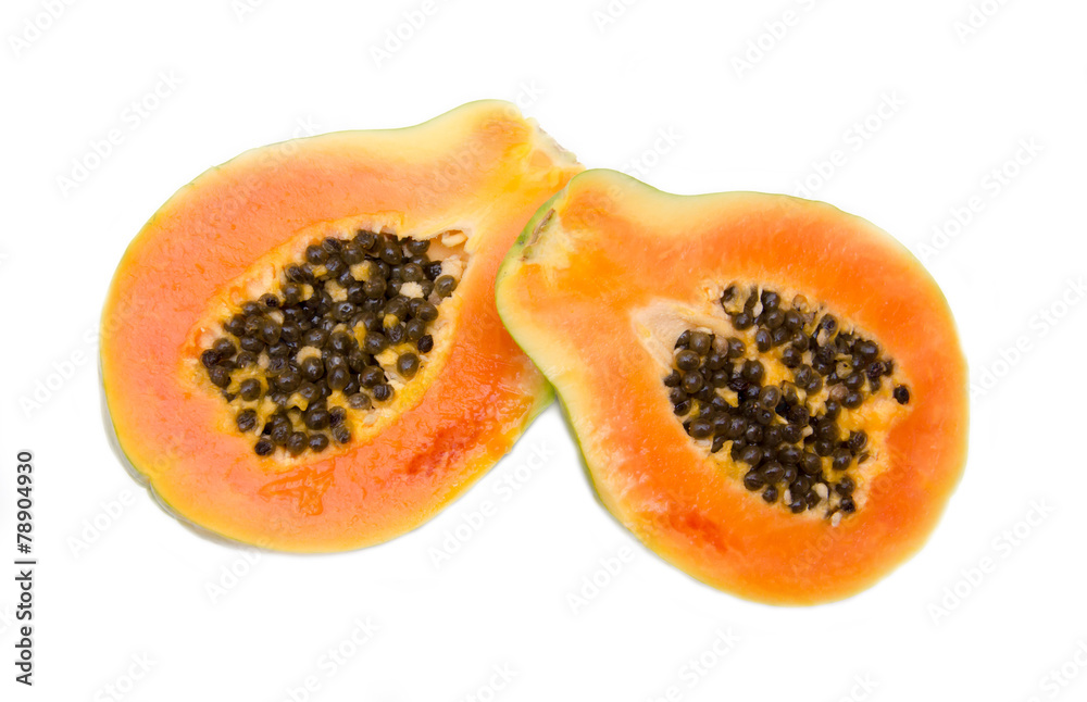 Fresh papaya cut in half on white background top view Fresh papaya cut in half on white background top view