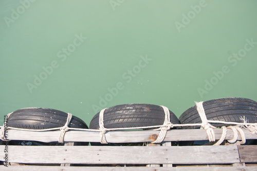 old tires at local port in Phuket, Thailand