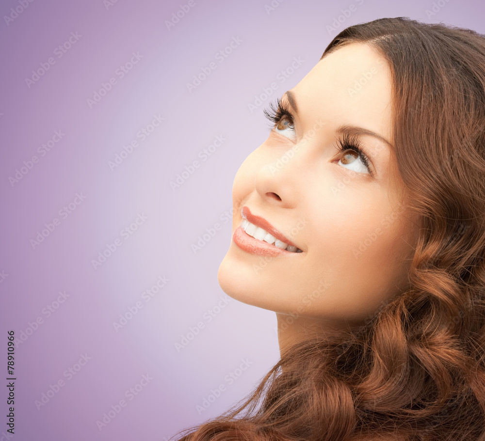 Naklejka premium beautiful young woman face