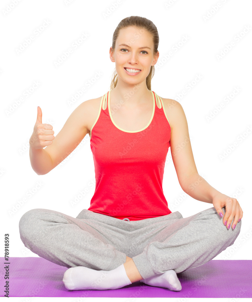 Young sporty girl sits is lotus pose Young sporty girl sits is lotus pose