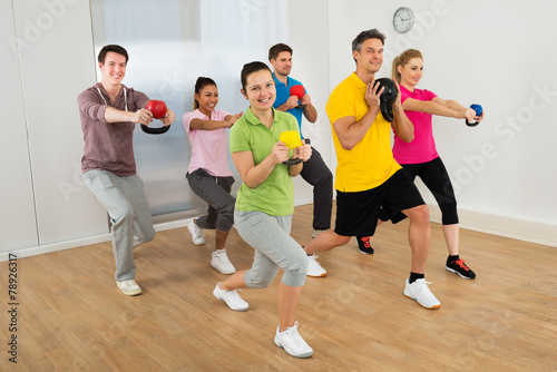 Multiethnic Group Of Happy People Exercising