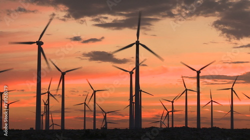 Power windmills in the California desert at sunset