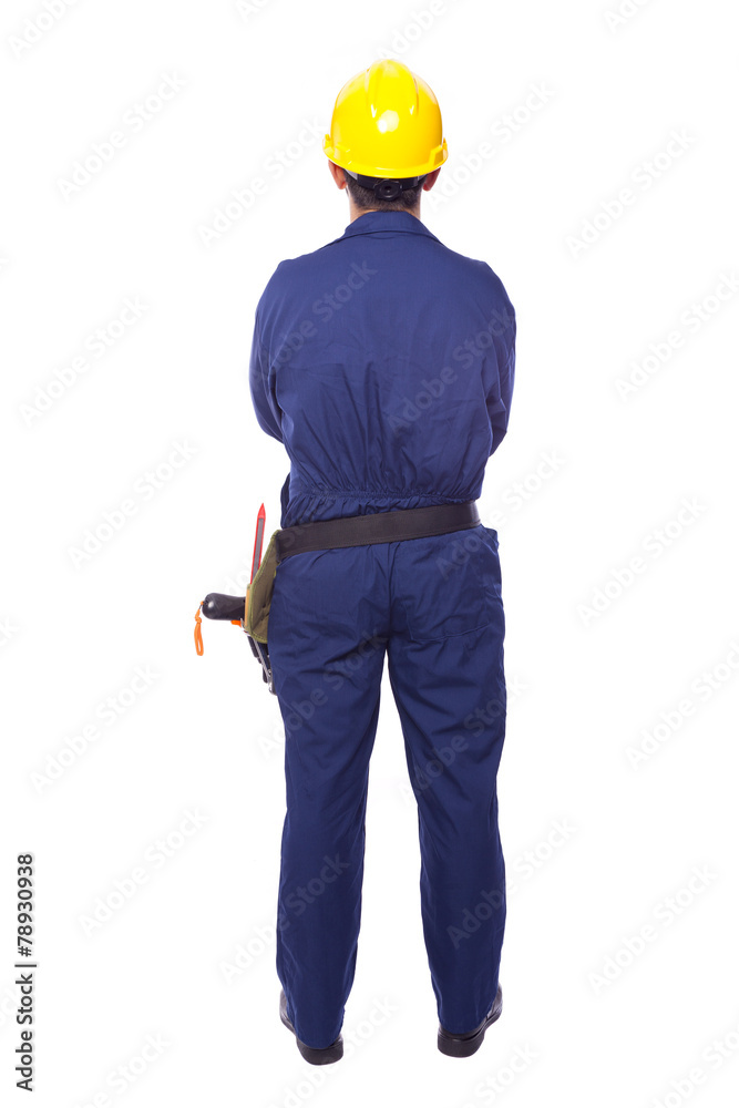 Rear view of a contractor standing on white background