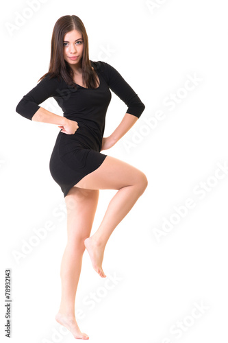 young beautiful dancer posing on a studio background © muro