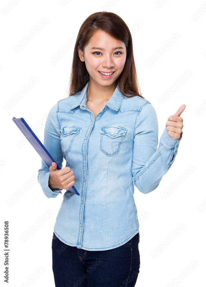 Asian woman hold with clipboard and thumb up Asian woman hold with clipboard and thumb up