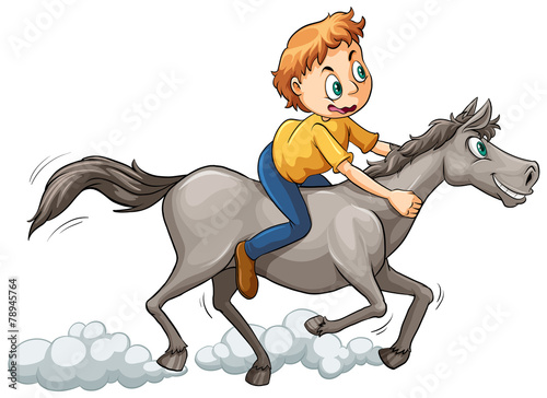 A boy riding a horse