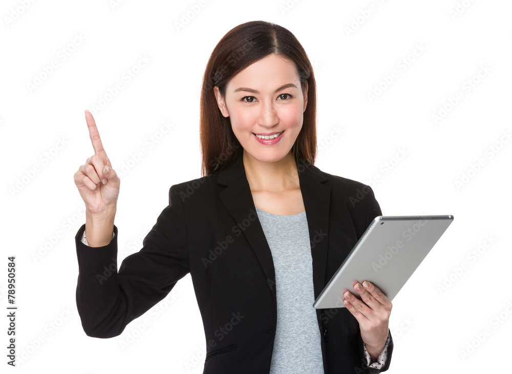 Businesswoman hold with tablet and finger point up Businesswoman hold with tablet and finger point up