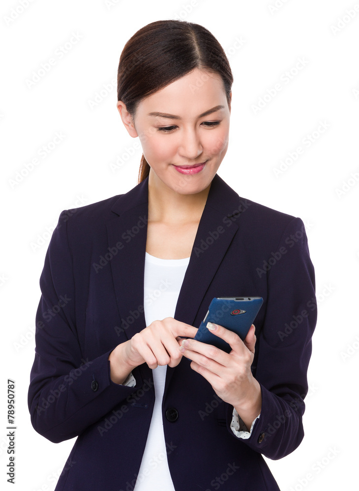 Businesswoman use of cellphone Businesswoman use of cellphone