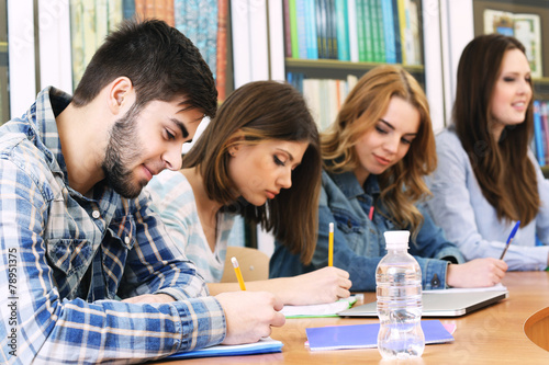 Group of students sitting a...