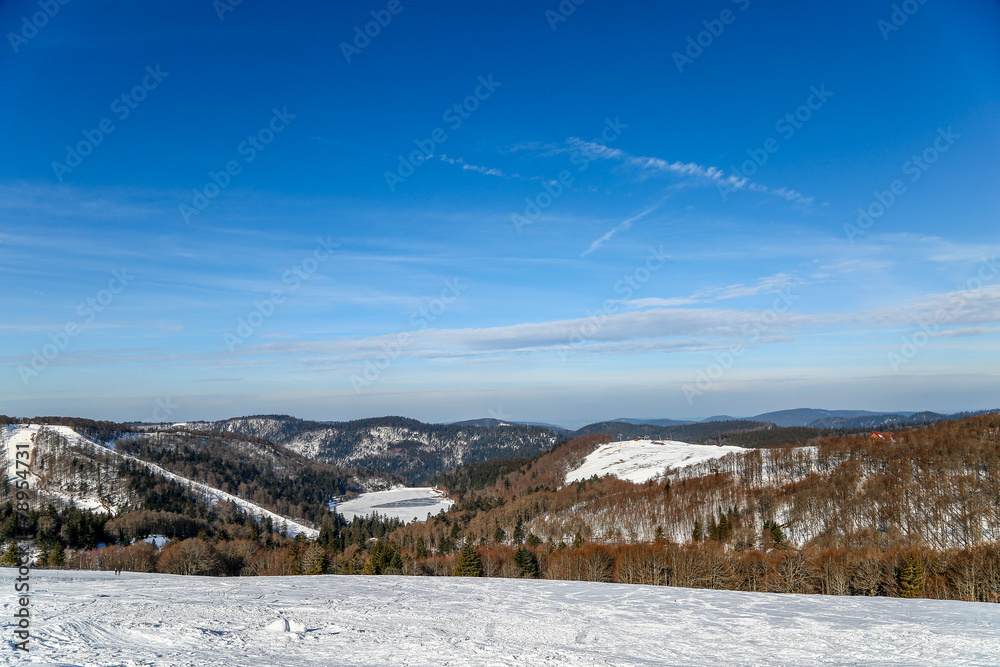 snow skiing landscape of mountains in Vosges, France