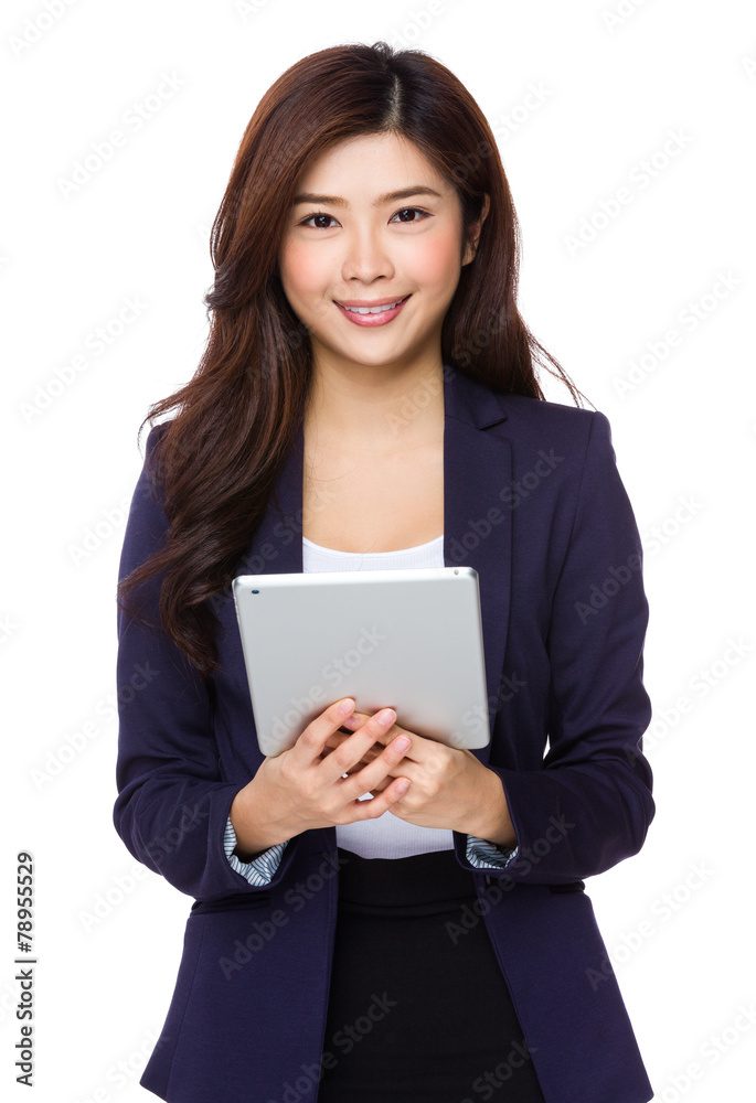 Businesswoman use of digital pad Businesswoman use of digital pad