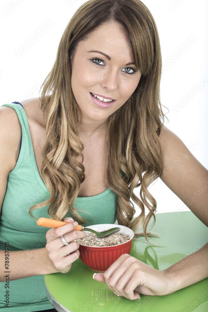Attractive Young Woman Eating Breakfast Cereals Attractive Young Woman Eating Breakfast Cereals