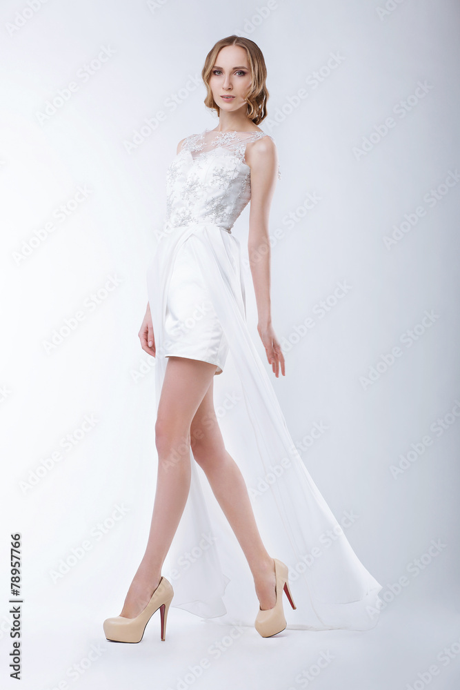 Naklejka premium Slender Fashion Model Wearing White Dress