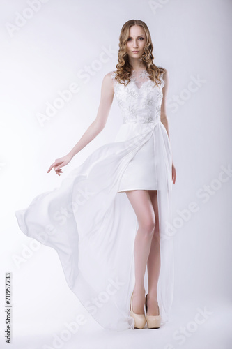 Elegance. Gorgeous Bride in Luxurious Dress