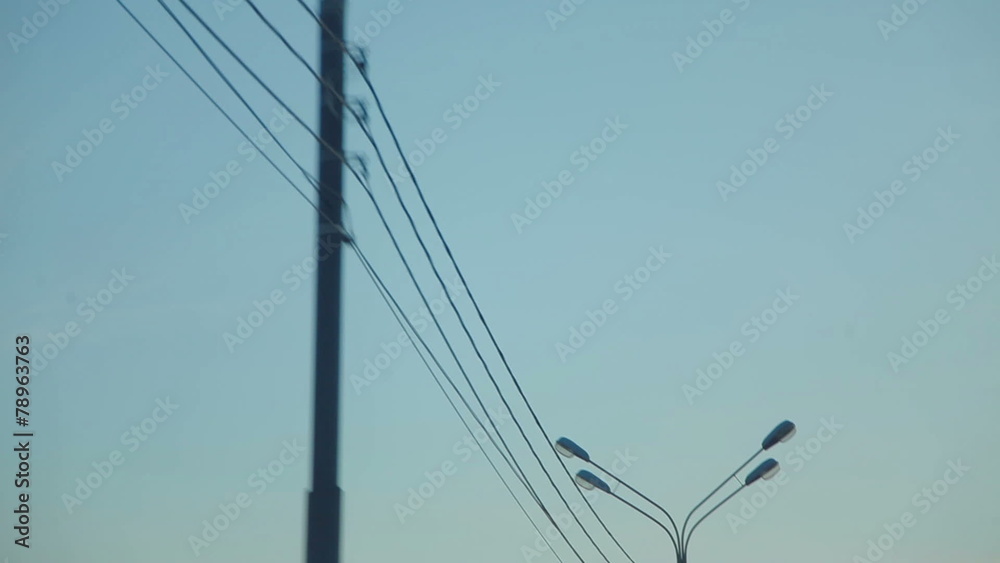 Row of wire pole along road