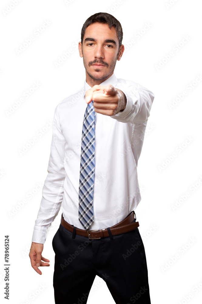 Confident businessman pointing to the front Confident businessman pointing to the front