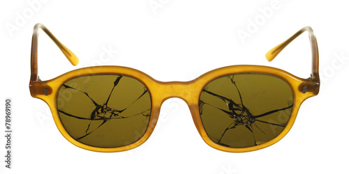 Broken sunglasses fashioned from plastic isolated on white backg