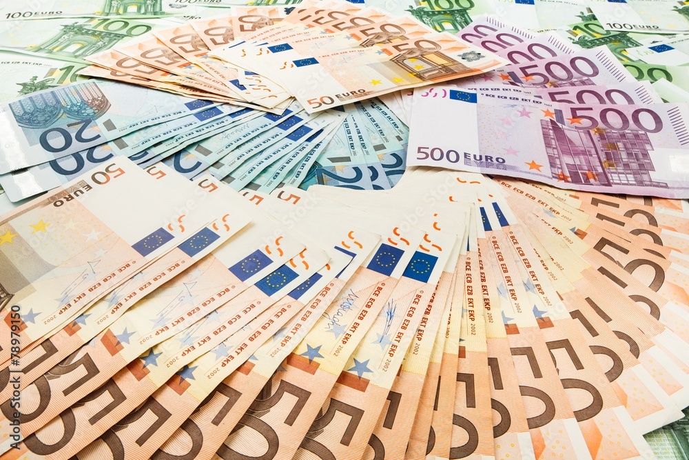 Naklejka premium paper money euro. background of banknotes