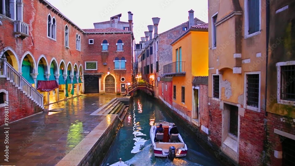 beautiful venice, italy, motor boat in the channel