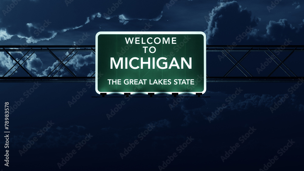 Michigan USA State Welcome to Highway Road Sign at Night