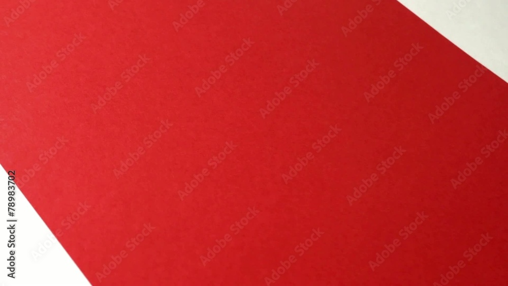 The man draws on red paper Merry man The man draws on red paper Merry man