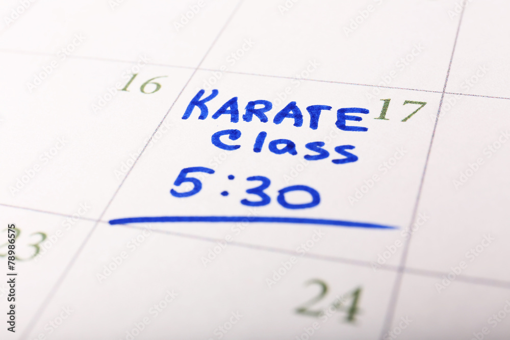 Written plan Karate Class on calendar page background Written plan Karate Class on calendar page background