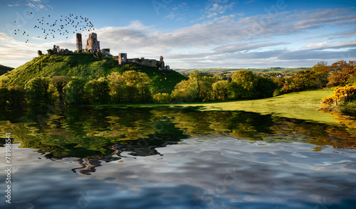 Lake and hill with castle ruin landscape