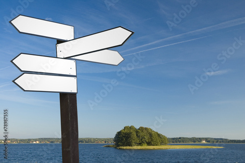 Guidepost on a lakeshore