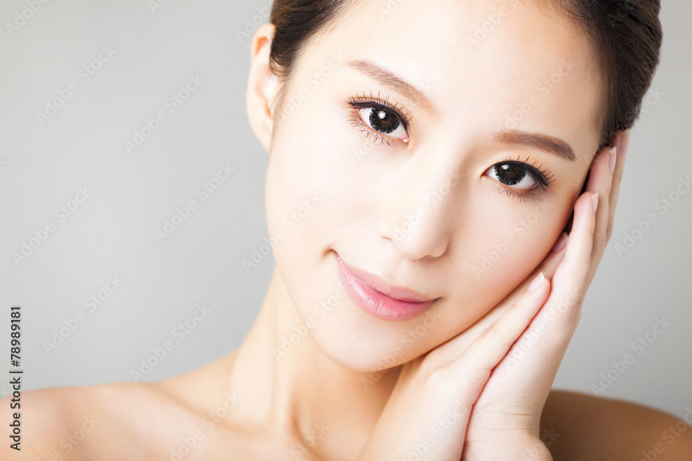 closeup smiling young  beautiful  woman face