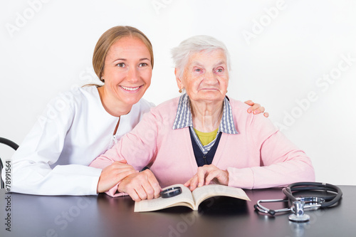 Elderly woman and young doctor