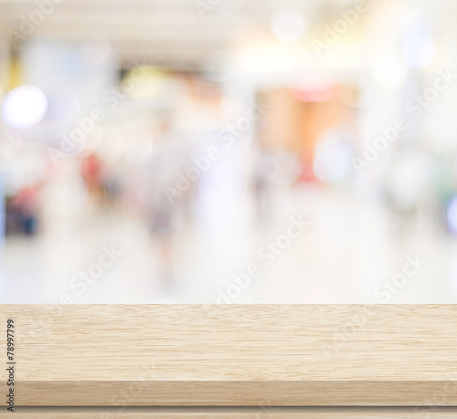 Empty table and blurred store bokeh background, product display