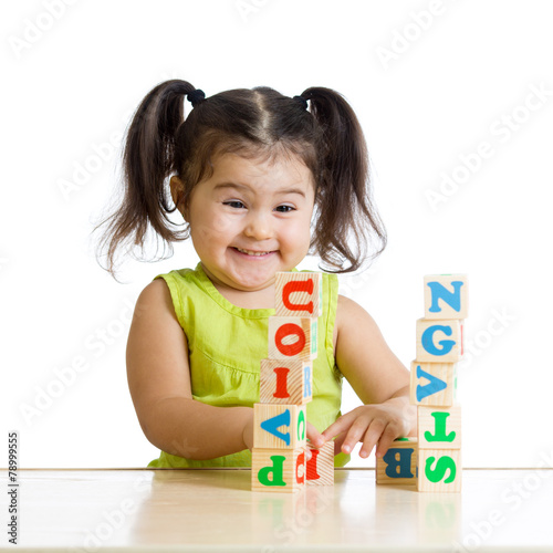 smiling little girl is buil...