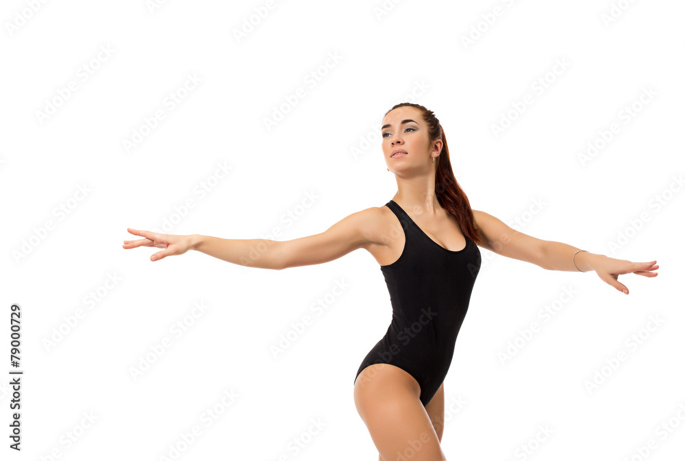 Dreamy female dancer posing at camera