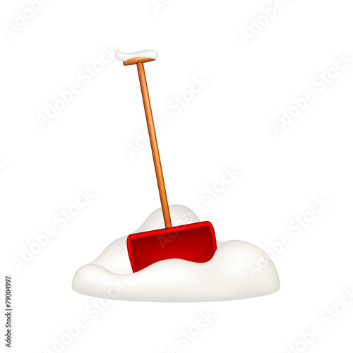 Snow shovel standing in snow