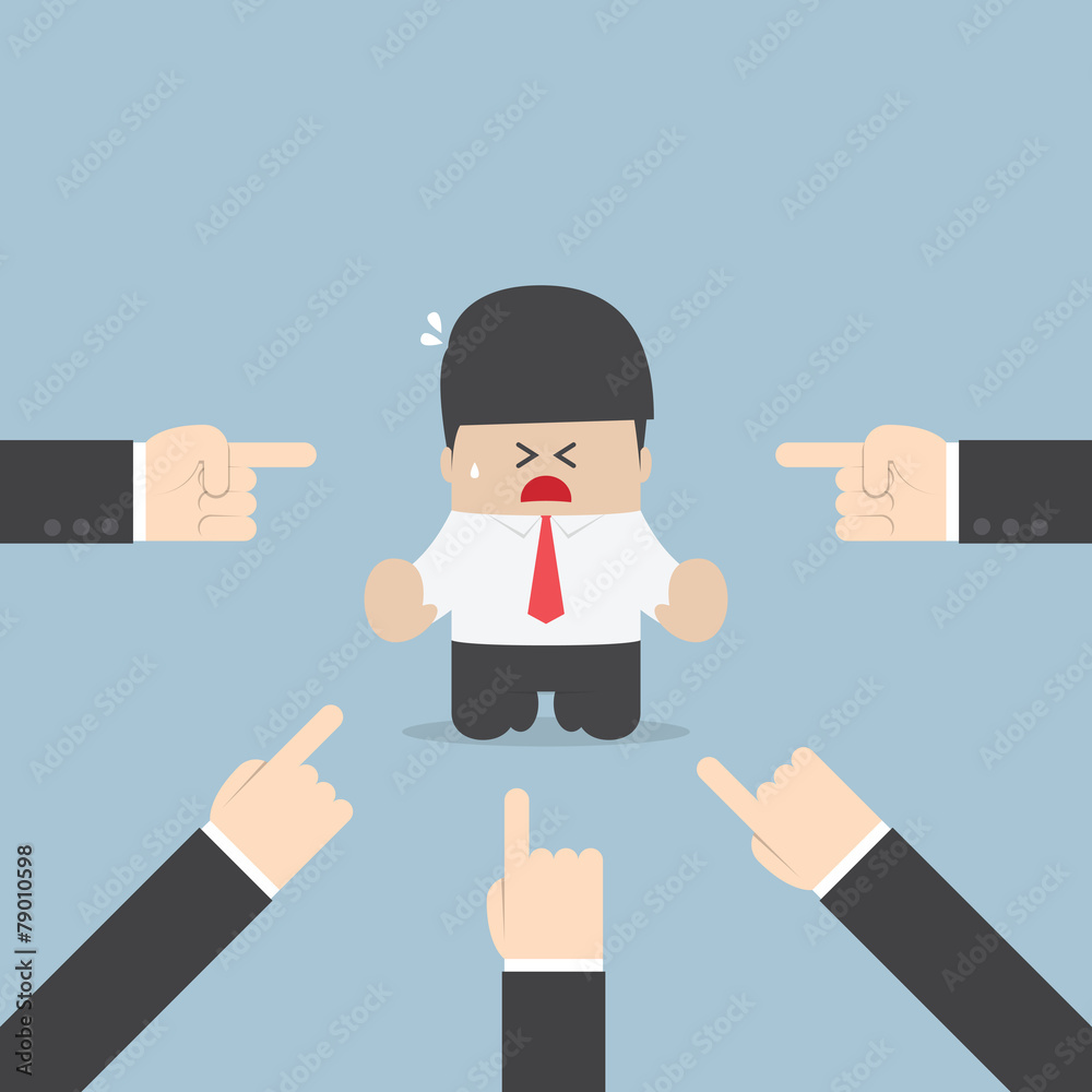 Businessman being pointed by a lot of hands Businessman being pointed by a lot of hands