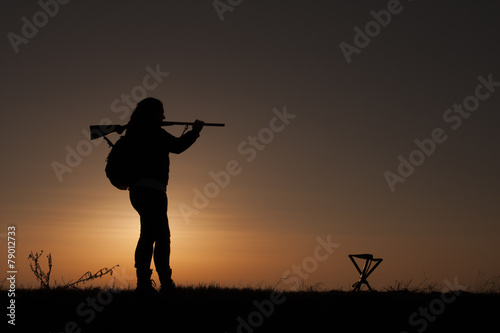 Women sunset hunting © bubamare023