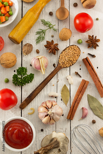 herbs and spices on wood