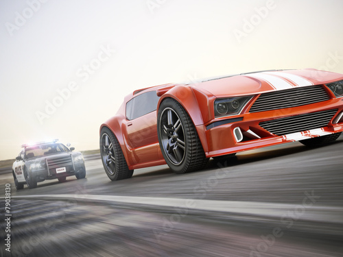 Police car chasing of an exotic sports car with motion blur. photo