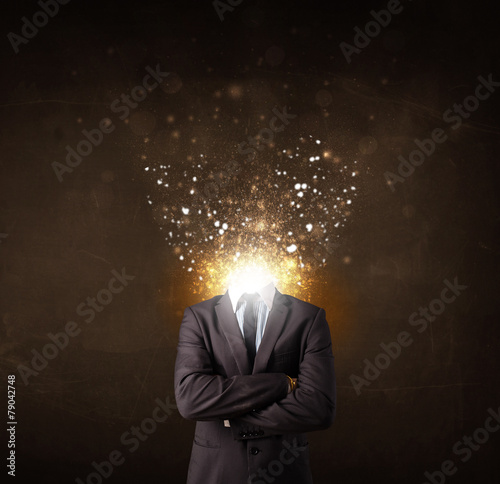 Business man with glowing exploding head