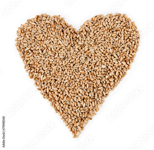 Wheat in the form of heart isolated on white