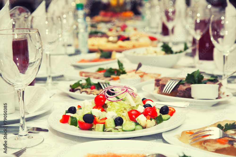 Greek salad on the festive table