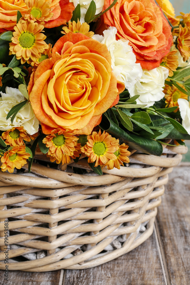 Bouquet of orange roses and ivory carnation flowers Bouquet of orange roses and ivory carnation flowers