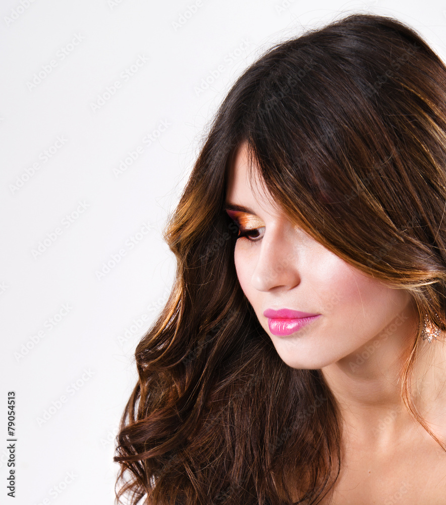 Beautiful young girl on a light background Beautiful young girl on a light background