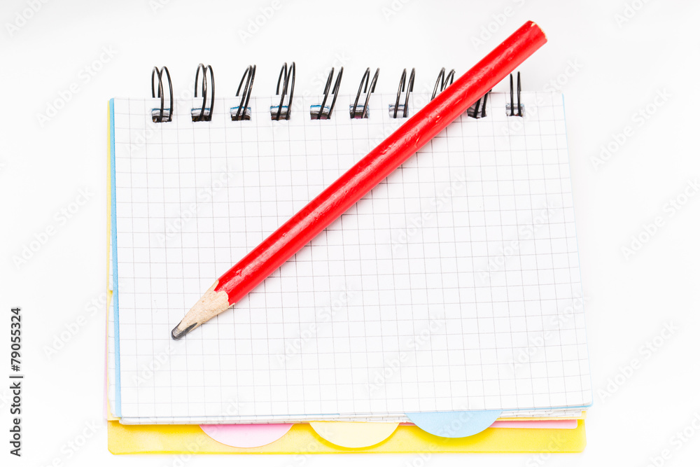 Notebook with pencil on white background Notebook with pencil on white background