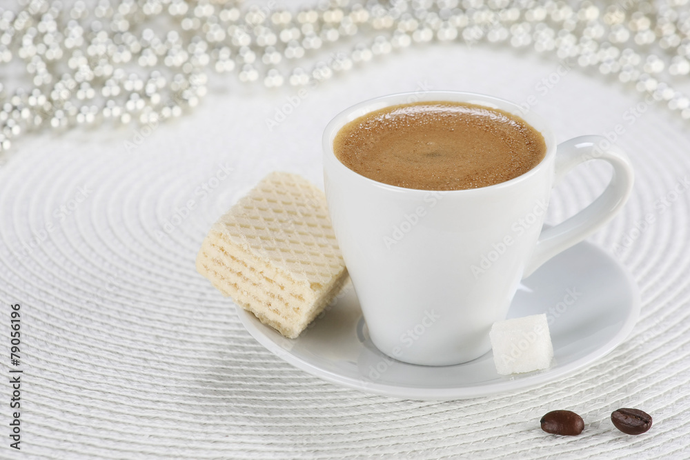 cup of coffee on a white wicker a mat cup of coffee on a white wicker a mat