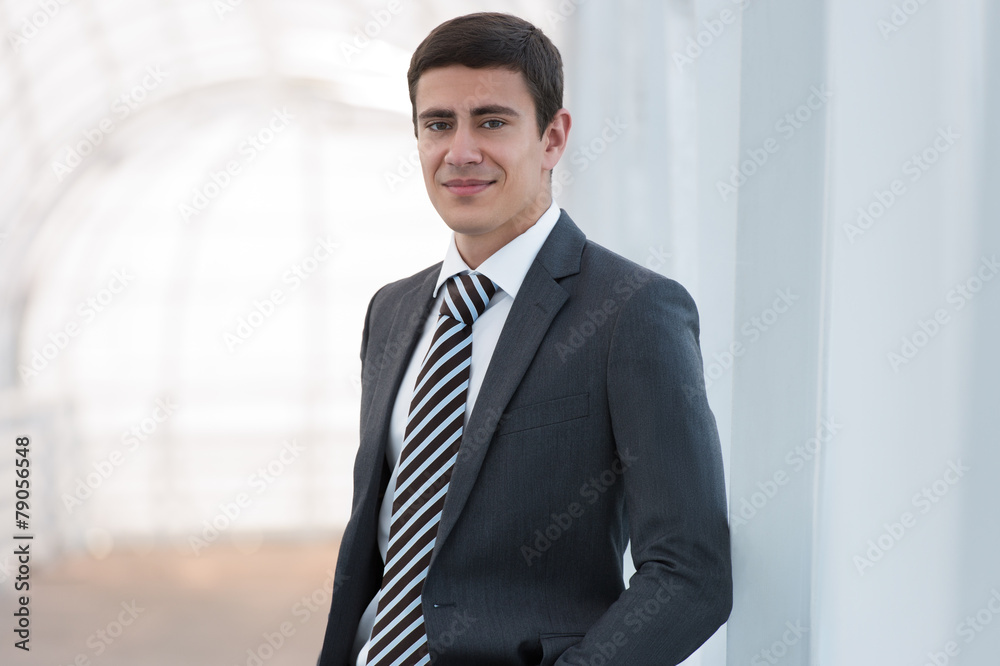 Portrait of handsome confident young businessman Portrait of handsome confident young businessman