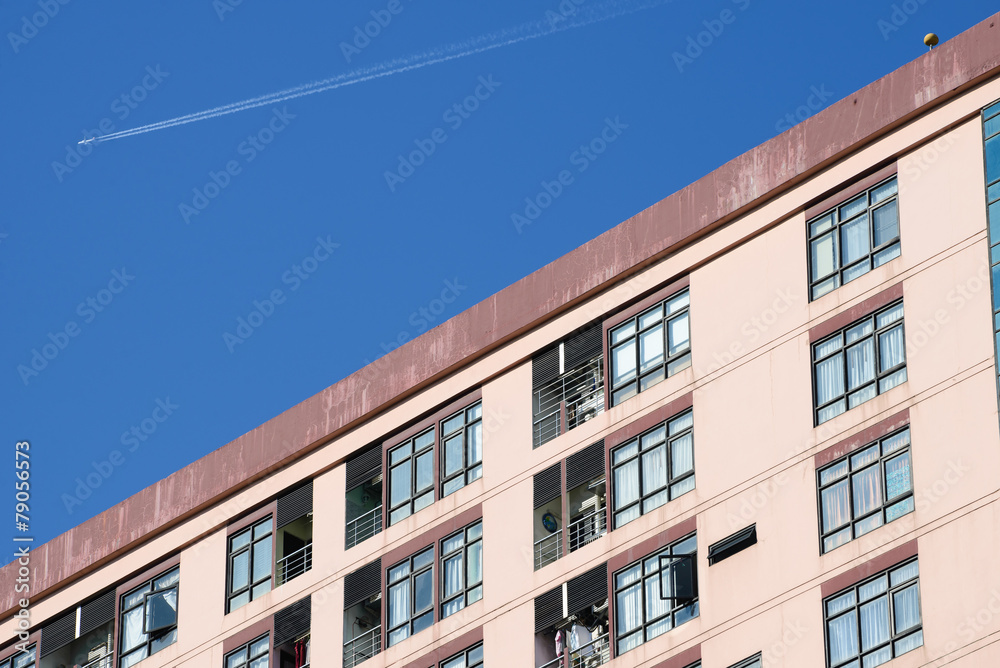 Apartment with blue sky and air plane