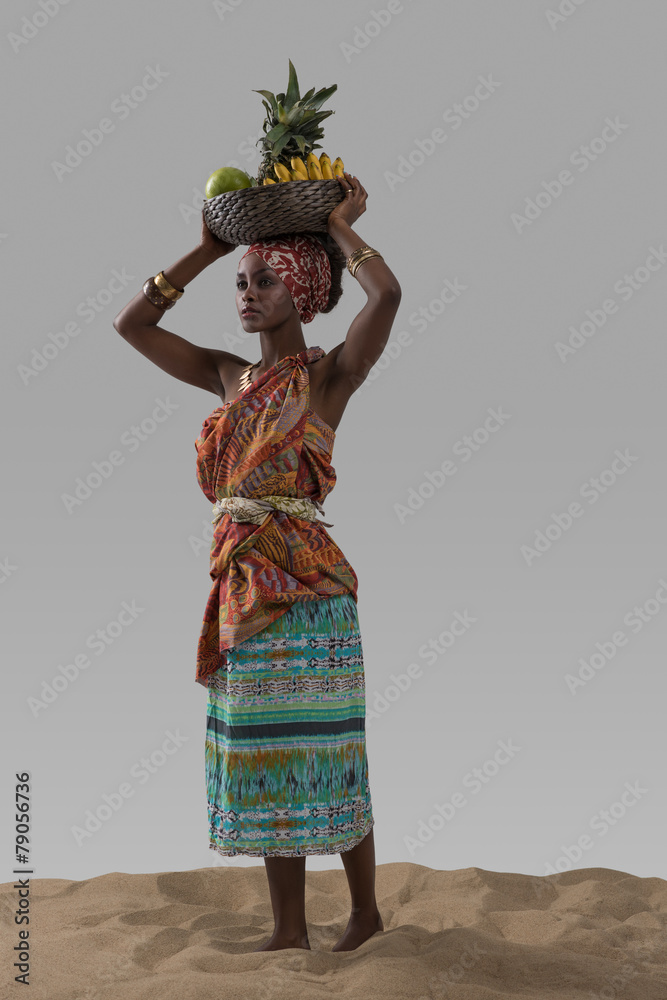 Attractive young african woman carrying fruits - obrazy, fototapety, plakaty 